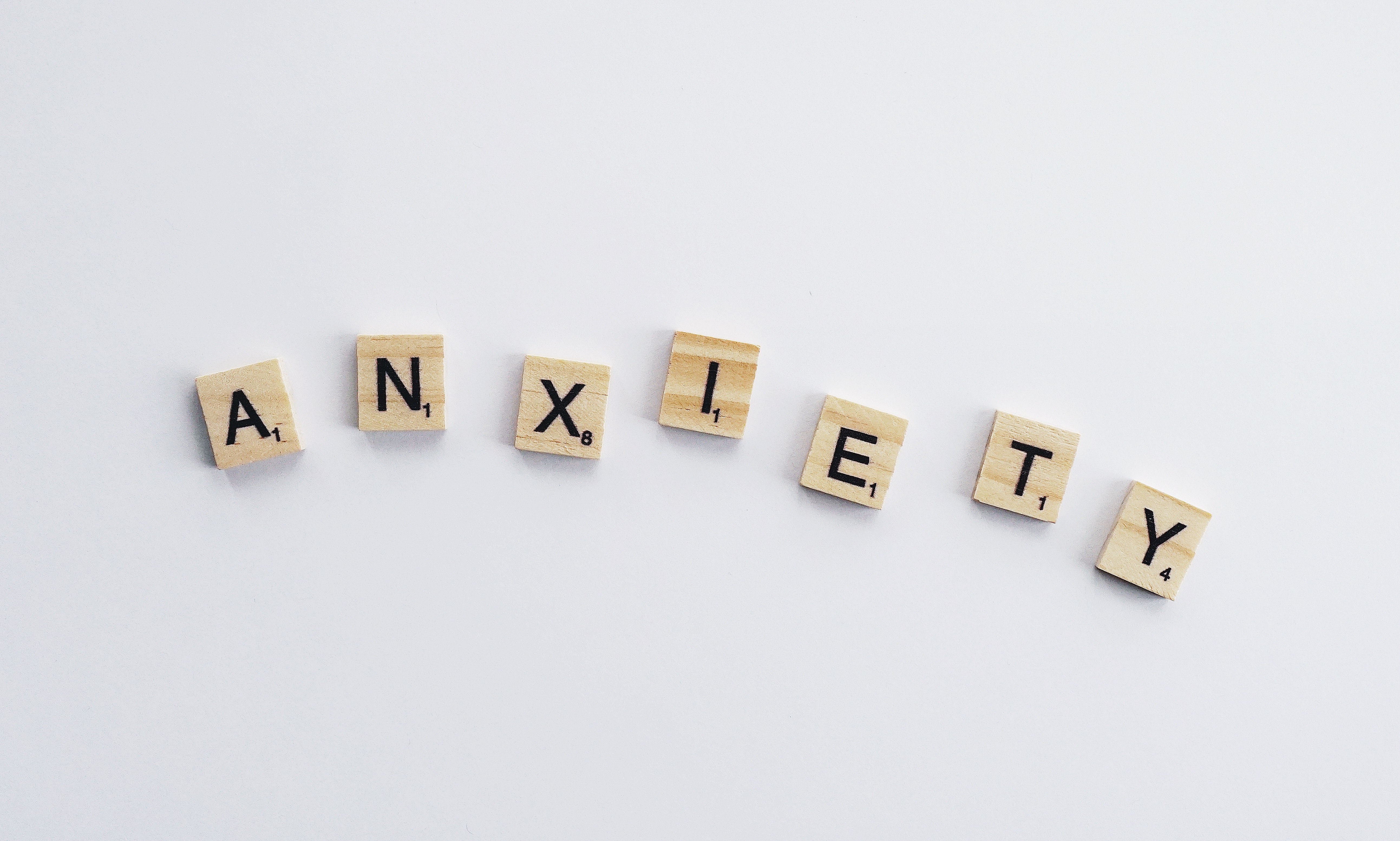 Anxiety is spelled out in letter tiles